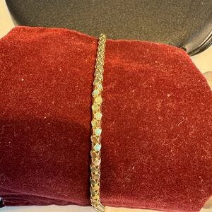 14 karat gold, plated sterling silver bracelet. Excellent used condition.